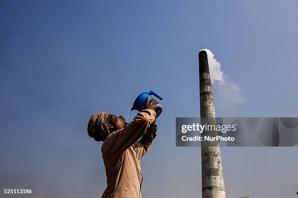 Worker is drinking water. The world is going through a speedy urbanization and Bangladesh is not an exception from this. Such rapid urbanization...