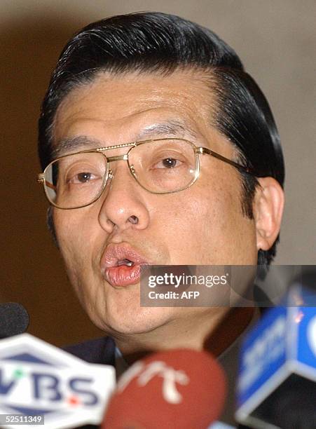 Zhang Ronggong, spokesman for Taiwan's Kuomintang party, gives a press conference at the Diaoyutai State Guest House in Beijing, 30 March 2005. The...