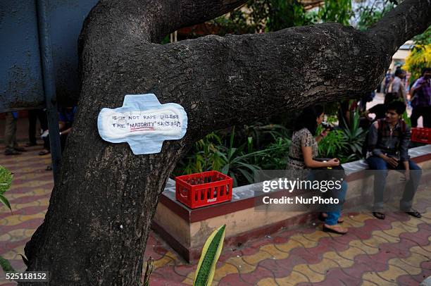 Anti sexism messages written on sanitary napkins during a Sanitary napkin protest in Kolkata, India.