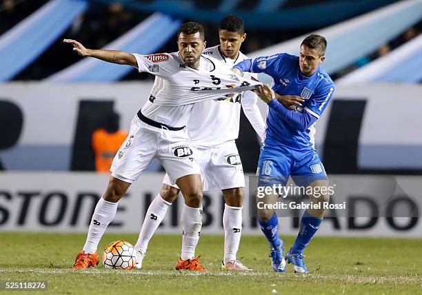 Rafael Carioca of Atletico Mineiro fights for the ball with Ricardo Noir of Racing Club during a first leg match between Racing Club and Atletico...