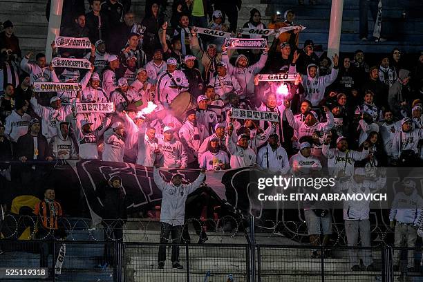 Fans of Brazil's Atletico Mineiro cheer for their team during the Copa Libertadores 2016 round before the quarterfinals first leg match against...