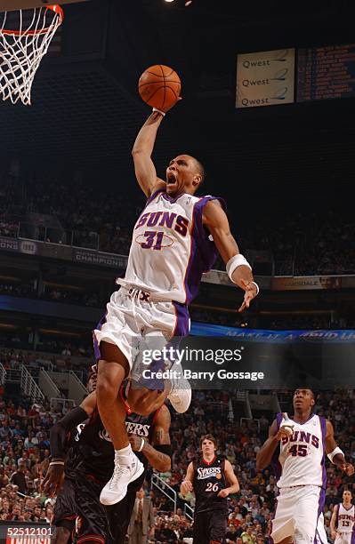 Shawn Marion of the Phoenix Suns shoots against the Philadelphia Seventy Sixers on March 30, 2005 at America West Arena in Phoenix, Arizona. NOTE TO...