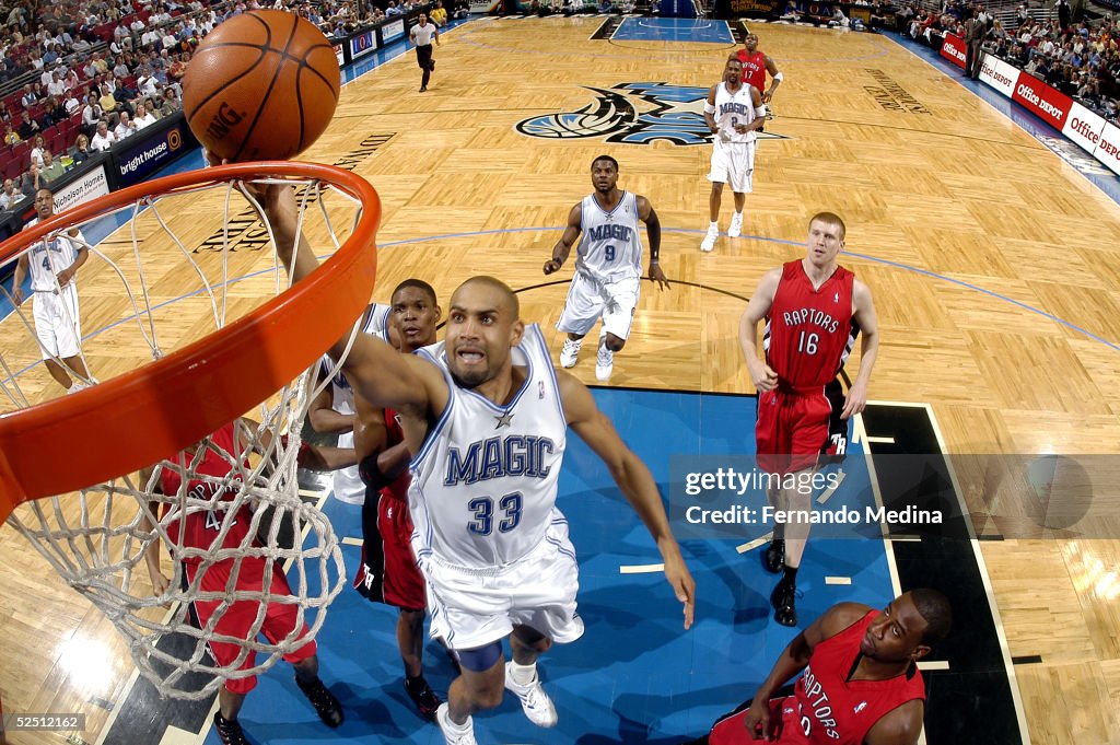 2005 Toronto Raptors Grant Hill of the Orlando Magic shoots against the Toronto Raptors on ...