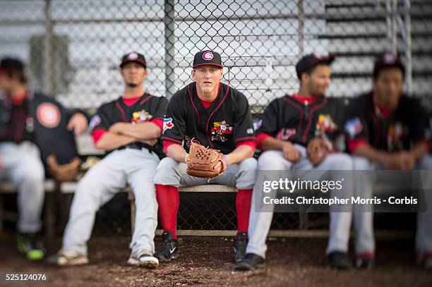 The Vancouver Canadians pitcher, Jonathon Wandling, sits in the bullpen before a game vs. The Everett Aquasox at Everett Memorial Stadium.