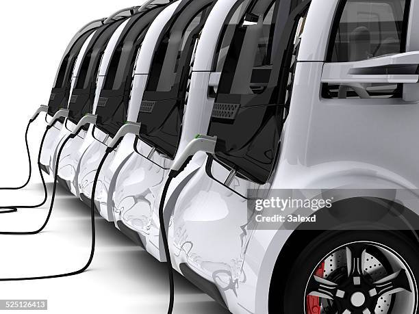 charging electric cars - cars in a row stock pictures, royalty-free photos & images