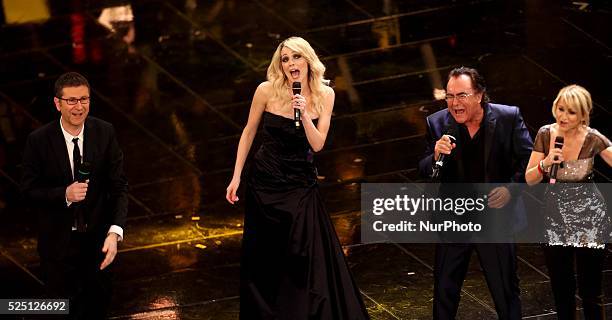 Fabio Fazio , Laura Chiatti , Albano and Luciana Littizzetto in Sanremo during day 3 of the Sanremo Italian Music Festival, on February 14, 2013....