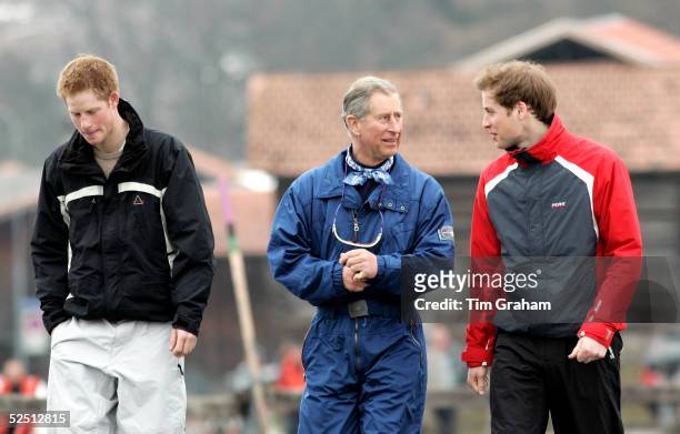 Prince Charles walks with his sons Prince William and Prince Harry during the Royal Family's ski break at Klosters on March 31, 2005 in Switzerland....