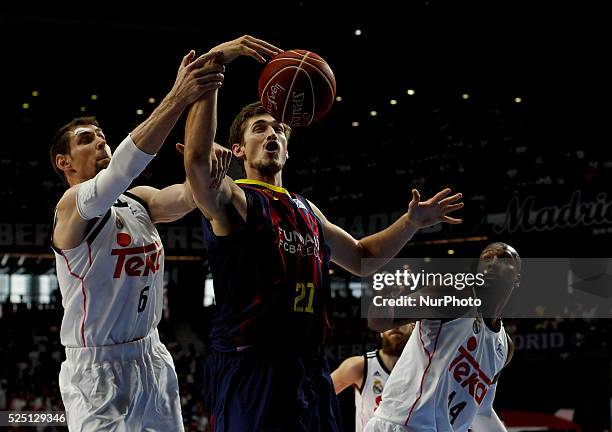 Real Madrid's Argentinean player Andres Nocioni and Barcelonas German player Tibor Pleiss during the Liga Endesa Basket 2014/15 finals, second match...