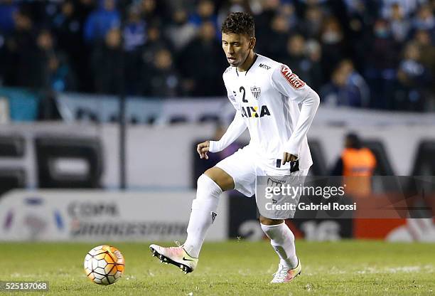 Marcos Rocha of Atletico Mineiro kicks the ball during a first leg match between Racing Club and Atletico Mineiro as part round of 16 of Copa...