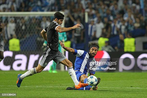 Chelsea's Spanish midfielder Cesc F��bregas vies with Porto's Itaian forward Pablo Osvaldo during the UEFA Champions League match between FC Porto...