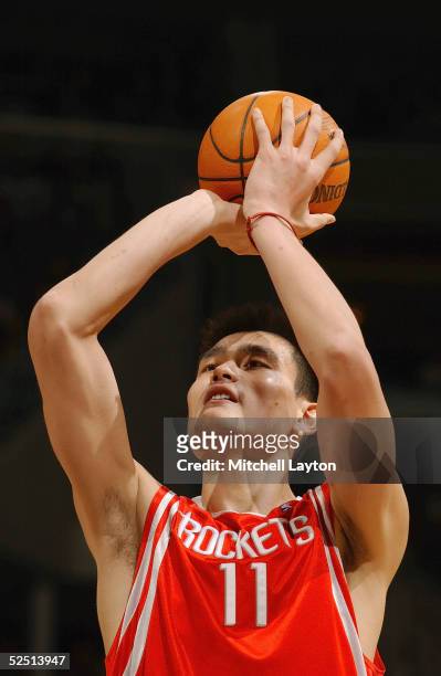 Yao Ming of the Houston Rockets shoots a free throw against the Washington Wizards during the game on March 2, 2005 at MCI Center in Washington D.C....