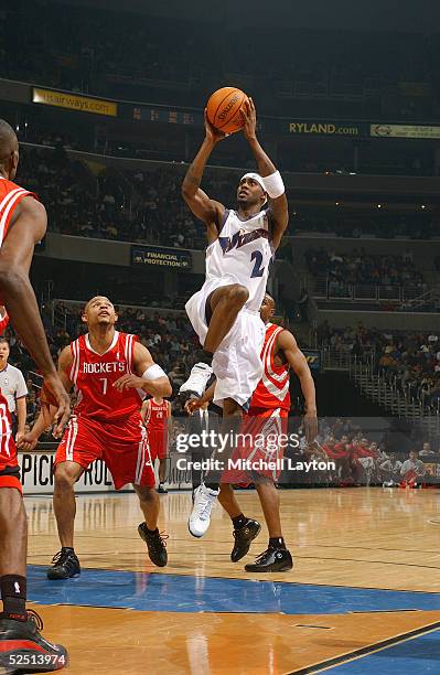Larry Hughes of the Washington Wizards shoots a layup against the Houston Rockets during the game on March 2, 2005 at MCI Center in Washington D.C....
