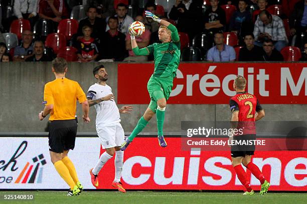 Panagiotis Glykos in action in front of Stefanos Athanasiadis and Lars Jacobsen during the UEFA Europa League soccer match EA Guingamp vs PAOK...