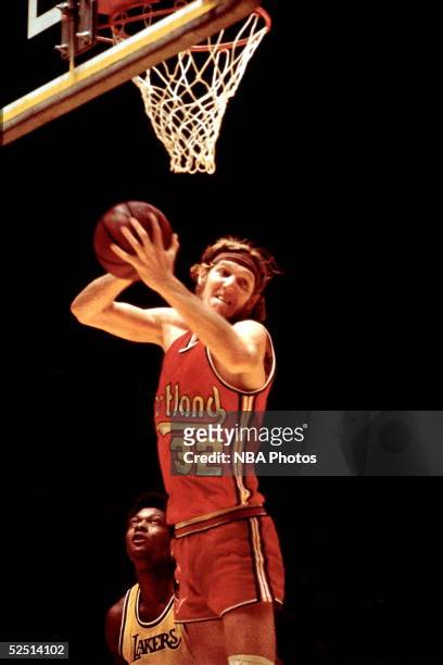 Bill Walton of the Portland Trailblazers grabs a rebound during a game against the Los Angeles Lakers.
