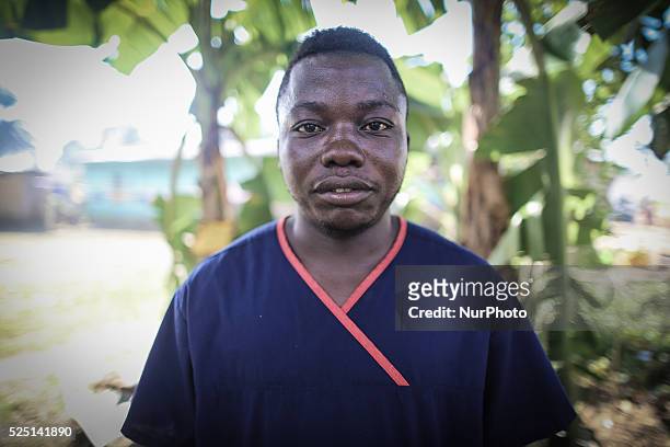 Portrait of Moses Massaquoi a hygenist who works in the Island Clinic Ebola Treatment Unit. This photo was taken after he had worn PPE for two hours...