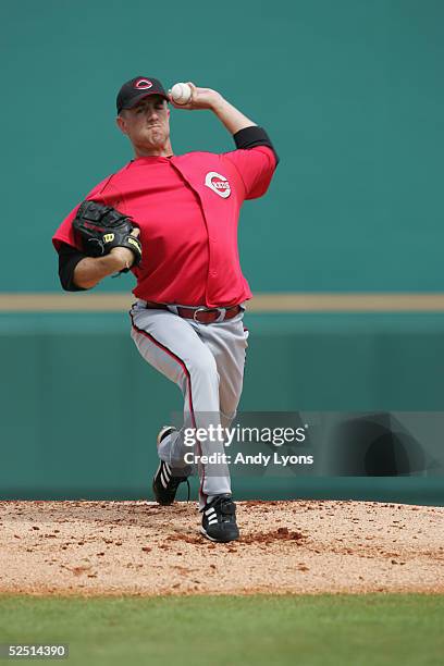 Pitcher Brandon Claussen of the Cincinnati Reds warms up before a Spring Training game against the Pittsburgh Pirates on March 8, 2005 at McKechnie...