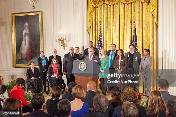 Mark Barden, father of Daniel, a Sandyhook Elementary School shooting victim, speaks as he introduces US President Barack Obama prior to Obama's...