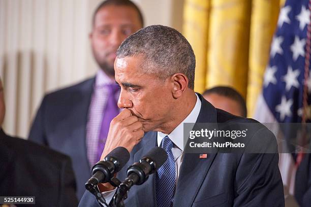 President Barack Obama gets emotional as he speaks on reducing gun violence in the East Room of the White House on January 5, 2016 in Washington, DC.