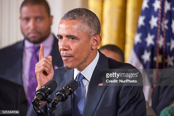 President Barack Obama speaks on reducing gun violence as Vice President JOe Biden looks on in the East Room of the White House on January 5, 2016 in...