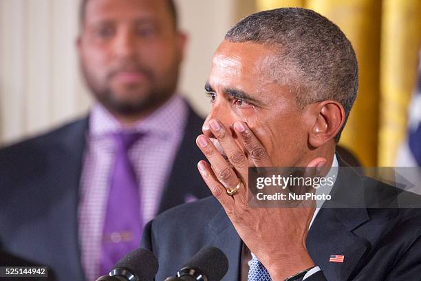 President Barack Obama gets emotional as he speaks on reducing gun violence in the East Room of the White House on January 5, 2016 in Washington, DC.