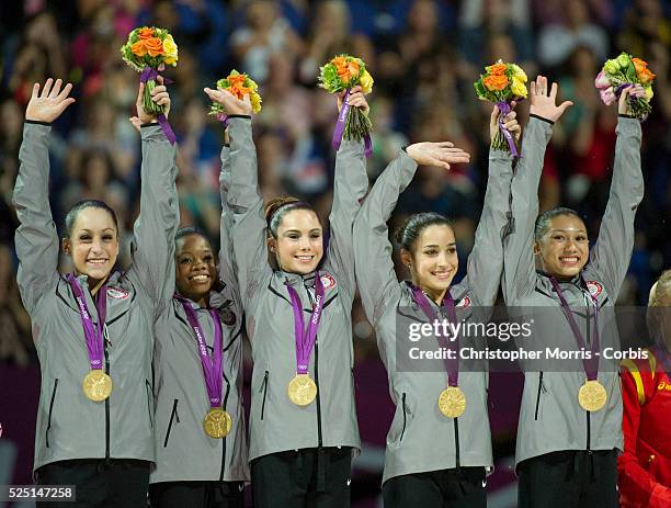 Gymnasts, left to right, Jordyn Wieber, Gabrielle Douglas, McKayla Maroney, Alexandra Raisman and Kyla Ross on the podium during the medal ceremony...