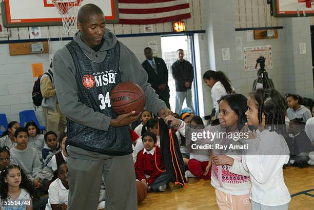 New York Knicks guard Jamal Crawford vists students students at PS/MS 279 for a ?C.H.A.M.P.S? school assembly stressing to them the importance of...