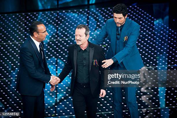 Carlo Conti, Rocco Papaleo, Alessandro Gassman attends the 66th Sanremo Music Festival on February 12, 2016.