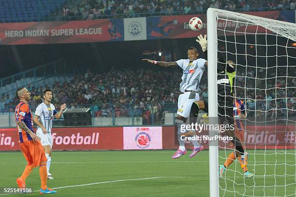 Atletico de Kolkata and FC Pune City players in action during their ISL match at Salt Lake Stadium on November 7, 2014 in Kolkata, India. FC Pune...