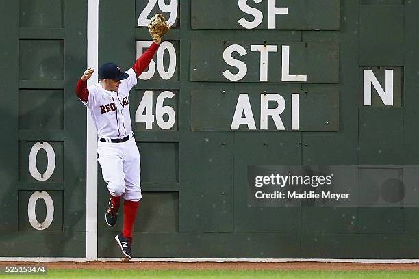 Brock Holt of the Boston Red Sox catches a ball hit by Kelly Johnson of the Atlanta Braves during the sixth inning on April 27, 2016 in Boston,...