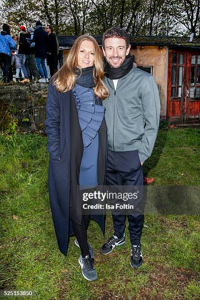 Katrin Kraus, wearing a dress of COS and her husband producer Oliver Berben attend the presentation of a joint project by COS and Michael Sailstorfer...