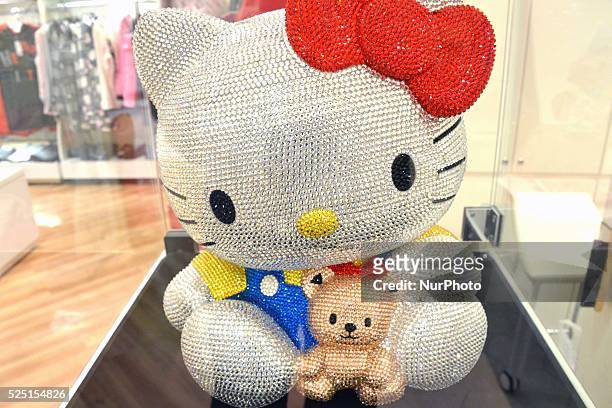 Hello Kitty figurine studded with a total of 19,636 Swarovski crystals, during Swarovski's Hello Kitty in Ginza Tokyo on December 14, 2014.