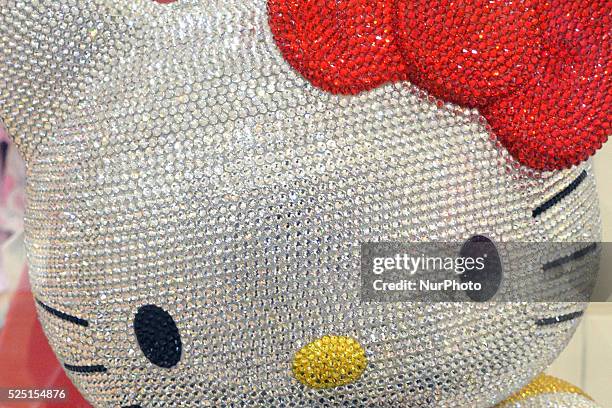 Hello Kitty figurine studded with a total of 19,636 Swarovski crystals, during Swarovski's Hello Kitty in Ginza Tokyo on December 14, 2014.
