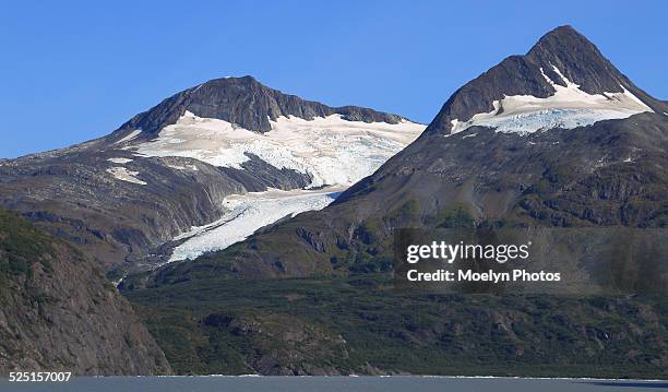 blue sky over portage lake and glaciers - portage glacier stock pictures, royalty-free photos & images