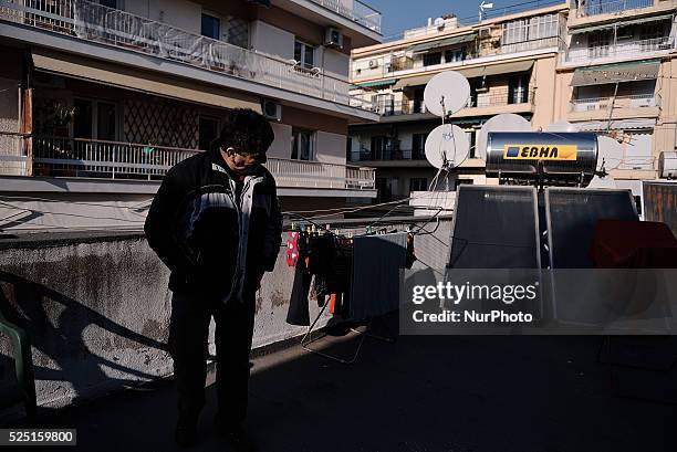 Iskandar, a Syrian refugee photographed on the terrace of the building. Due to its geographical position, Greece has the role of immigrants reception...