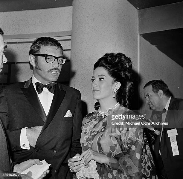 Actor Adam West with Linda Cristal attends an event in Los Angeles,CA.