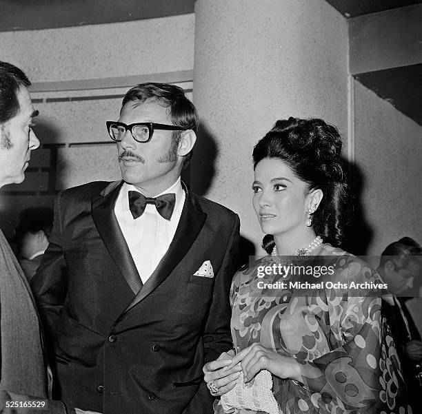 Actor Adam West with Linda Cristal attends an event in Los Angeles,CA.