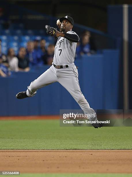 Jimmy Rollins of the Chicago White Sox makes the play and throws out the baserunner in the eighth inning during MLB game action against the Toronto...