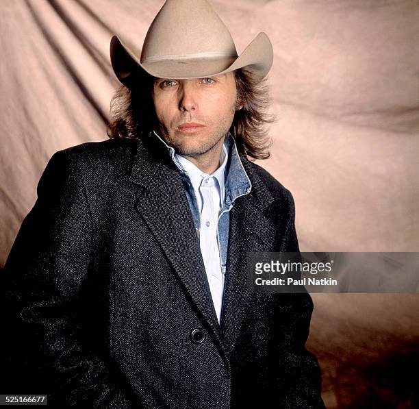 Portrait of country musician Dwight Yoakam at Farm Aid, Ames, Iowa, April 4, 1990.