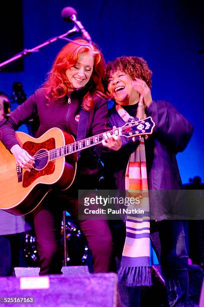 Musicians Bonnie Raitt and Mavis Staples perform together, Chicago, Illinois, May 31, 2003.