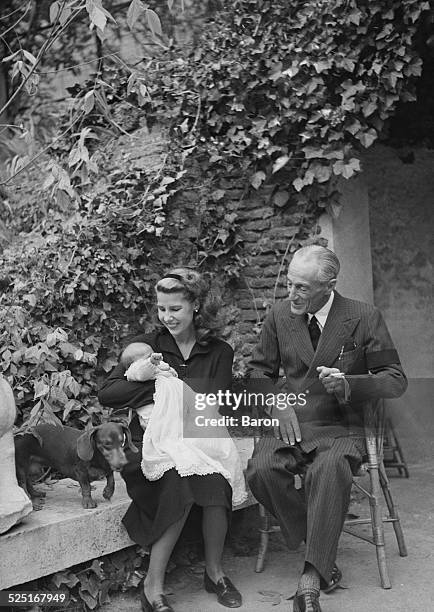 Cayetana Fitz-James Stuart , Duchess of Montoro with her father, Jacobo Fitz-James Stuart , 17th Duke of Alba, and her first child, Carlos Fitz-James...