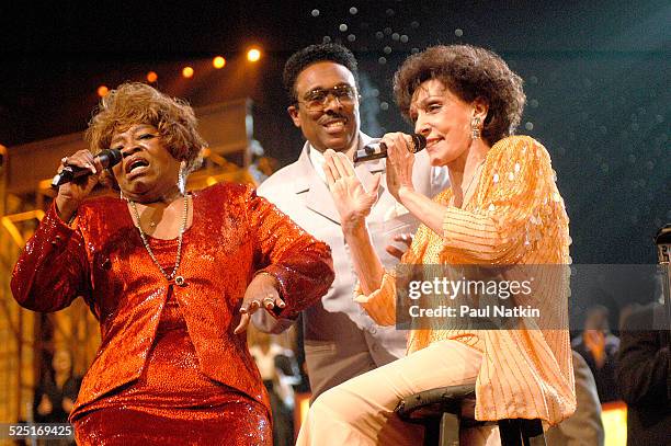 From left, gospel musicians Albertina Walker, unidentified, and Dottie Rambo perform onstage, Dallas, Texas, March 11, 2003.