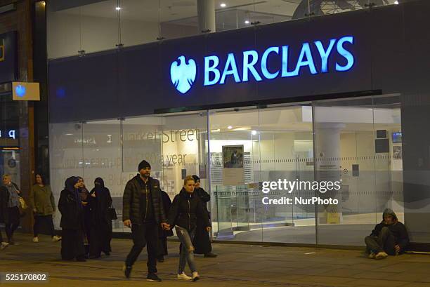 Light eminating from a branch of the Barclays Bank trading in Manchester, Greater Manchester, England, United Kingdom, on Tuesday 1st March 2016....