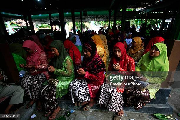 Residents dressed in traditional Javanese followed Nyadran ritual in Sewu Cemetery on June 8, 2015 in Bantul, Yogyakarta, Indonesia. Nyadran ritual...