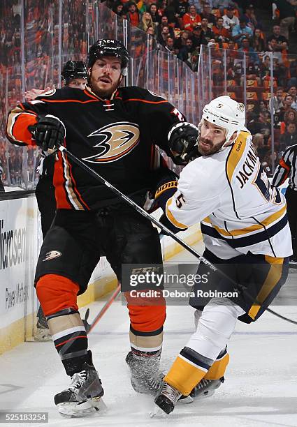 Simon Despres of the Anaheim Ducks battles against Barret Jackman of the Nashville Predators in Game Seven of the Western Conference First Round...