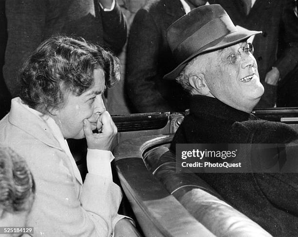 American President Franklin D. Roosevelt and his wife, First Lady Eleanor Roosevelt, as they ride in an automobile, Warm Springs, Georgia, November...