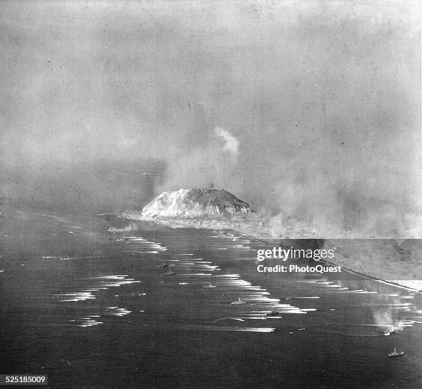 Aerial view of the US Sixth Fleet during the invasion of Iwo Jima, February 14, 1945. Mt Suribachi is in the background.