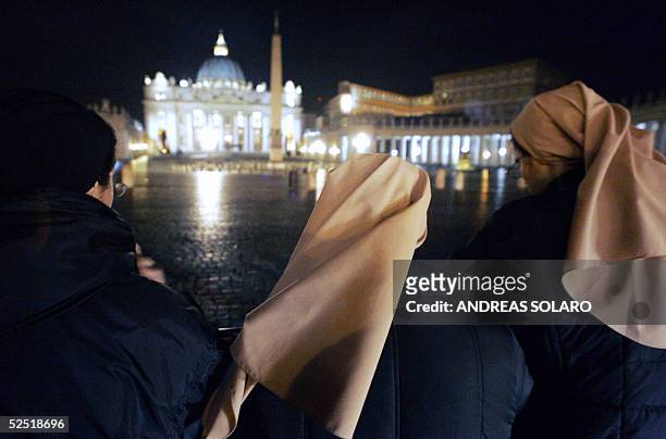 Two nuns pray on St Peter's square at the Vatican as they wait for news about the health of Pope John Paul II 31 March 2005. Pope John Paul II has a...