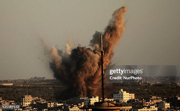 Smoke rises following what witnesses said was an Israeli air strike in Gaza August 20, 2014. Arab League chief Nabil al-Arabi accuses Israel of...