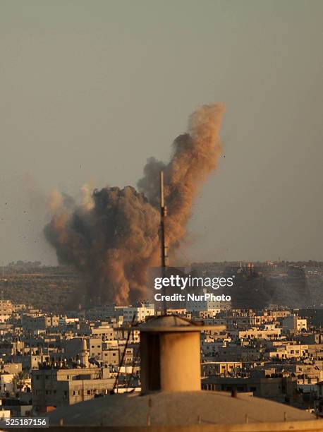 Smoke rises following what witnesses said was an Israeli air strike in Gaza August 20, 2014. Arab League chief Nabil al-Arabi accuses Israel of...