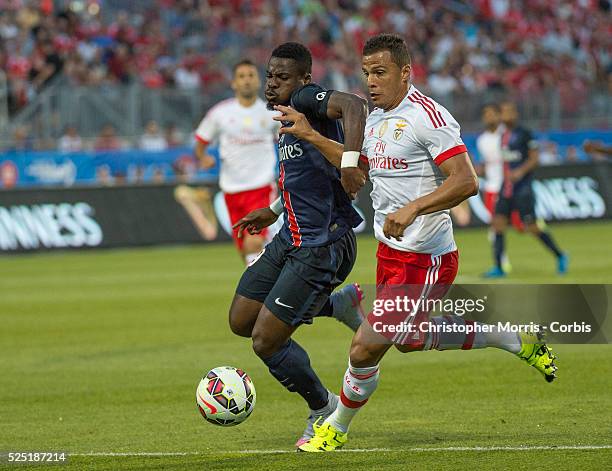 Paris St. Germain's Lima and SL Benfica's Serge Aurier in the International Champions Cup in Toronto.